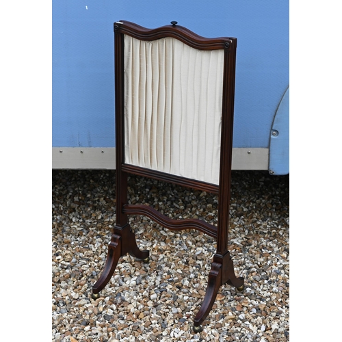 296 - #A mahogany framed screen with sliding pleated silk panel, 94 cm high