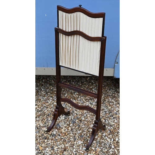 296 - #A mahogany framed screen with sliding pleated silk panel, 94 cm high