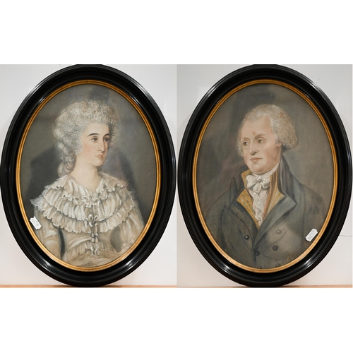 302 - A pair of 19th century oval watercolour portraits of a lady and gentleman, 32 x 24 cm (2)