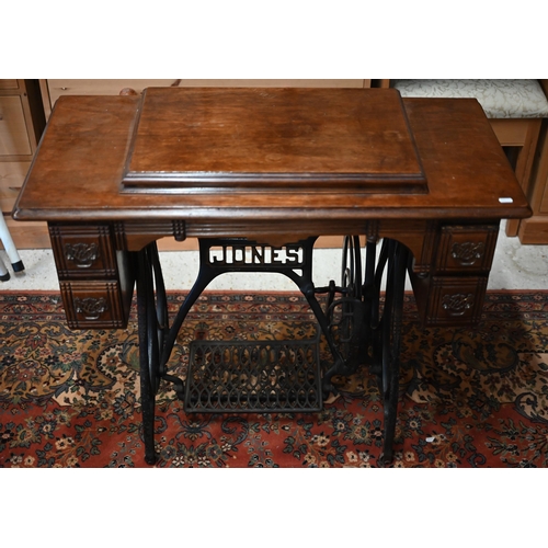 35 - A Jones treadle sewing machine, appears complete and original/unrestored