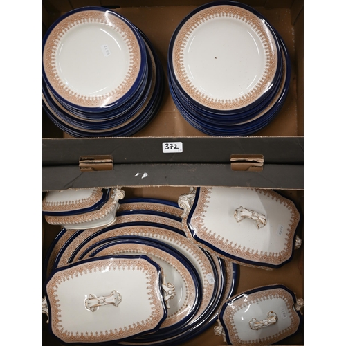 372 - A late Victorian Royal Worcester dinner service with painted sepia Gothic Revival borders and blue r... 