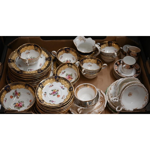 376 - An Aynsley china part tea service printed with floral sprays with blue, yellow and gilt rims, to/w v... 