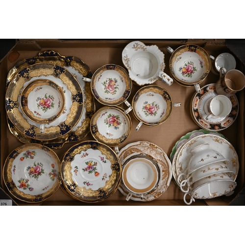 376 - An Aynsley china part tea service printed with floral sprays with blue, yellow and gilt rims, to/w v... 