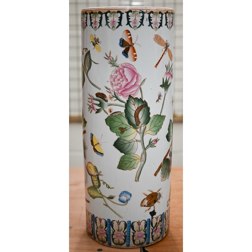 386 - A Chinese porcelain cylindrical stick stand painted with fruit, flowers and insects, 63 cm high to/w... 