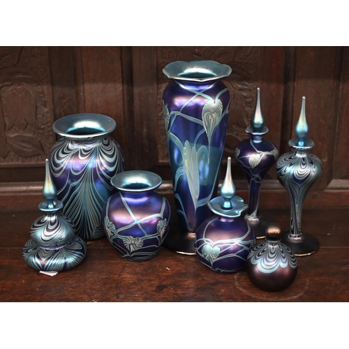 391 - A collection of Okra Art Nouveau style iridescent glass including five scent bottles and stoppers an... 