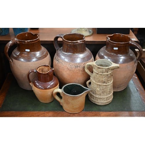 401 - Three large stoneware jugs and three smaller jugs (6)