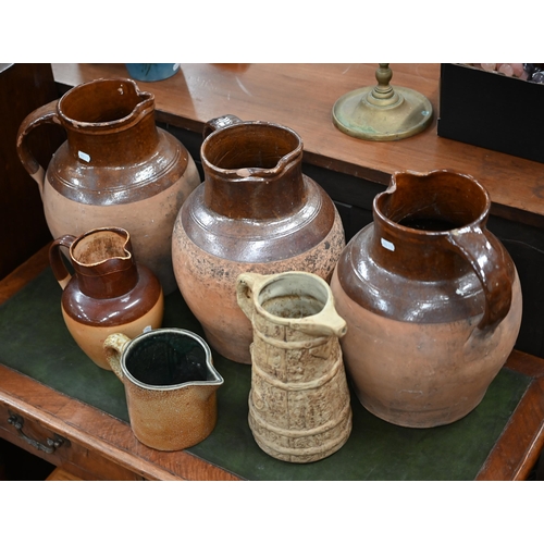 401 - Three large stoneware jugs and three smaller jugs (6)