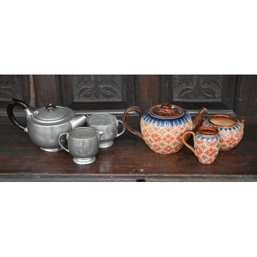 403 - #A Doulton Lambeth Slater's Patent stoneware three-piece tea service, to/w a Tudric Pewter Ware thre... 