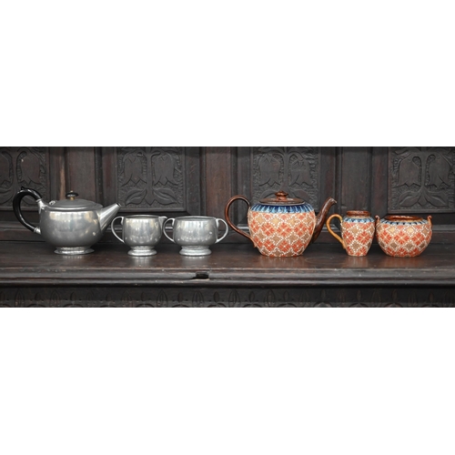 403 - #A Doulton Lambeth Slater's Patent stoneware three-piece tea service, to/w a Tudric Pewter Ware thre... 