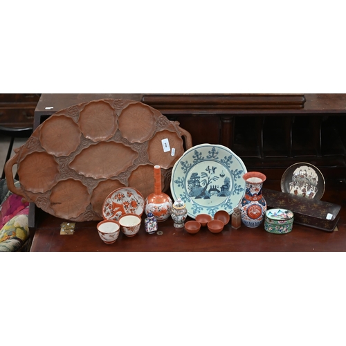 404 - A selection of 19th century and later Asian ceramics and collectables, to/w a foliate-carved wooden ... 