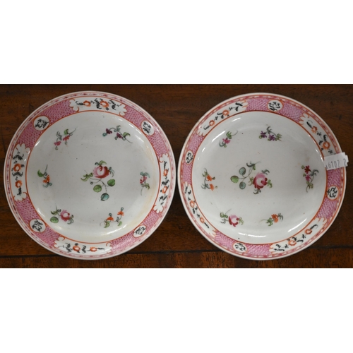 406 - A pair of 19th century Chinese famille-rose saucers and a pair of (non-matching) floral-painted tea ... 