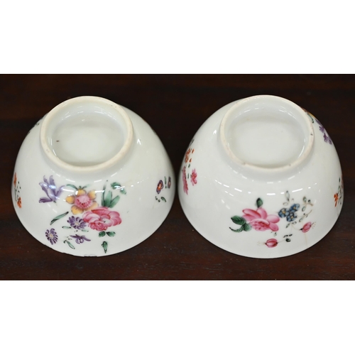 406 - A pair of 19th century Chinese famille-rose saucers and a pair of (non-matching) floral-painted tea ... 