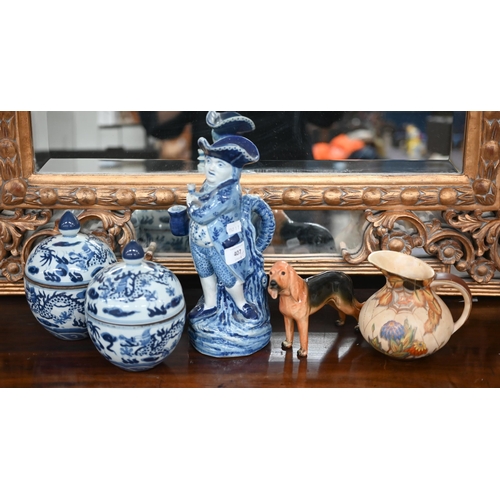 407 - A pair of Chinese blue and white porcelain ovoid jars and covers, painted with dragons 16.5 cm high ... 