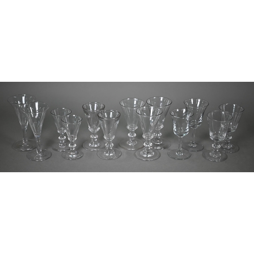 419 - #A pair of 19th century slender glass flute glasses with foliate etched decoration and ground-out po... 