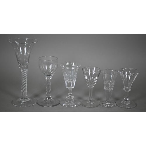 419 - #A pair of 19th century slender glass flute glasses with foliate etched decoration and ground-out po... 