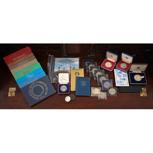 426 - A silver proof 1977 Jubilee crown and a 1969 Prince of Wales Investiture medallion (in cabinet) to/w... 