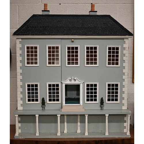 A large painted mansion doll's house with slate roof, 110 cm high x 94 cm wide