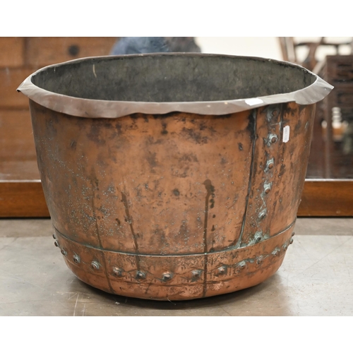 436 - An antique rivetted wash-copper, 36 cm high x 50 cm diam