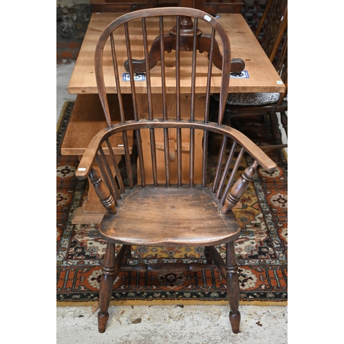 47 - A 19th century hoop back Windsor armchair