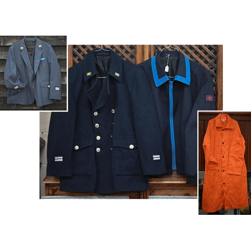 479 - A British Rail guard's uniform to/w over-jacket, tunic, another jacket and a long orange work-coat