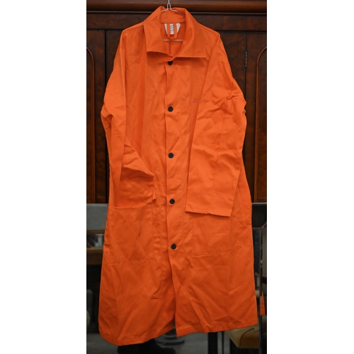 479 - A British Rail guard's uniform to/w over-jacket, tunic, another jacket and a long orange work-coat