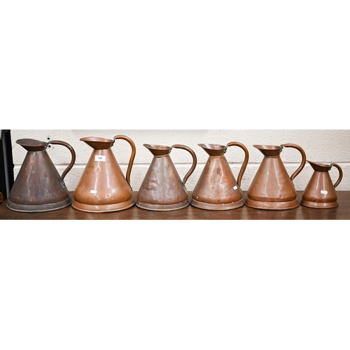 489 - Six antique conical copper rum-measures (6)