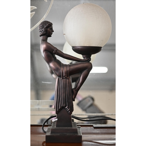 509 - An Art Deco cold-cast bronze figural table lamp with frosted glass globular shade, 42 cm high