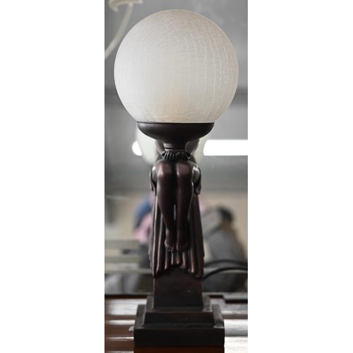 509 - An Art Deco cold-cast bronze figural table lamp with frosted glass globular shade, 42 cm high