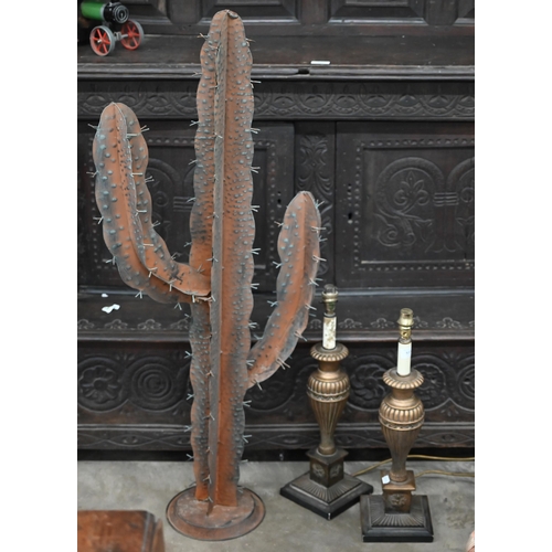 511 - A pair of gilt composite reeded baluster table lamps, to/w a metal cactus , 111 cm high (3)