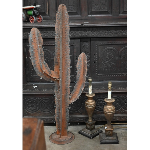 511 - A pair of gilt composite reeded baluster table lamps, to/w a metal cactus , 111 cm high (3)