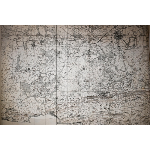 517 - A large collection of unframed Ordnance Survey and other maps - mostly UK and Kenya