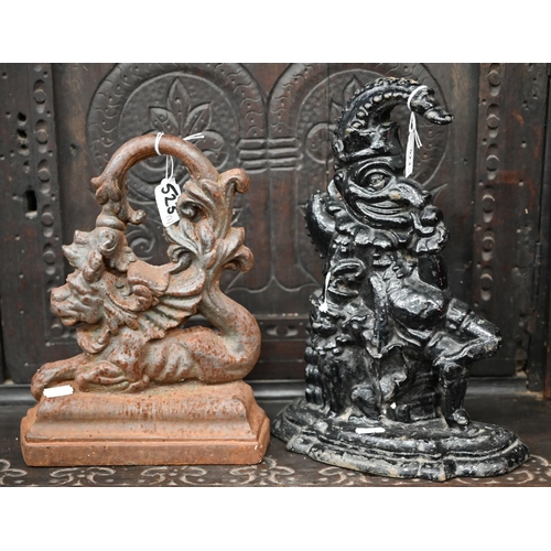 523 - Two Victorian cast iron doorstops - Mr Punch and Merlion (lion with fish's tail) (2)