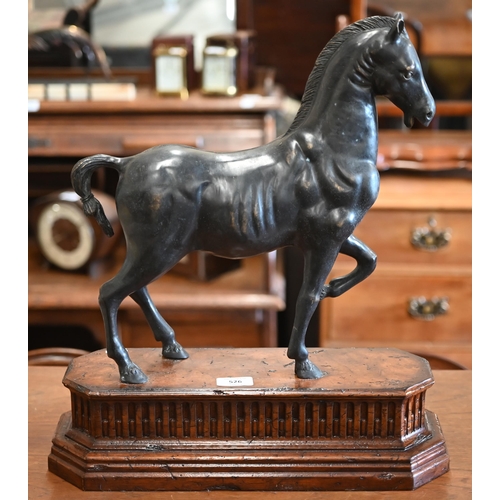 526 - A bronzed spelter figure of a pacing horse, in the 16th century manner, on walnut base, 49 x 43 cm o... 