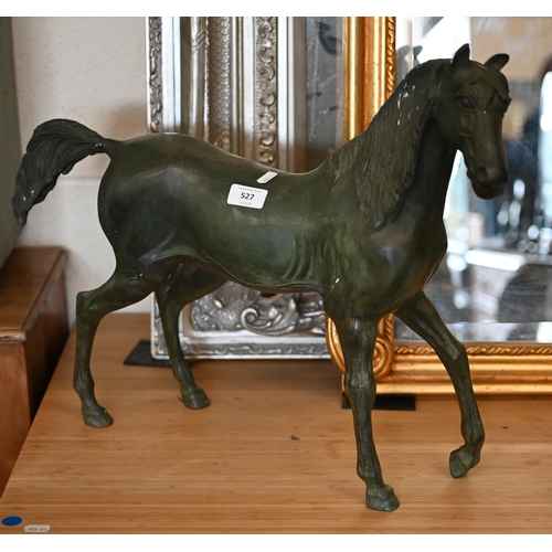 527 - A Verdigris-patinated bronze horse, unsigned, 46 x 60 cm