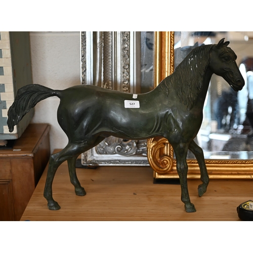 527 - A Verdigris-patinated bronze horse, unsigned, 46 x 60 cm