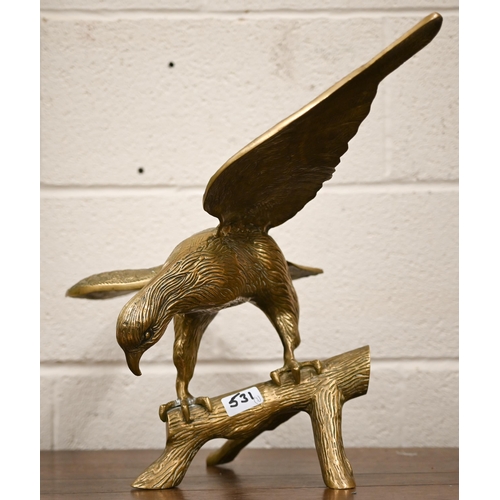 531 - A bronzed duck, taking off, 33 x 45 cm overall to/w a brass eagle and an Art Deco group of bronzed g... 