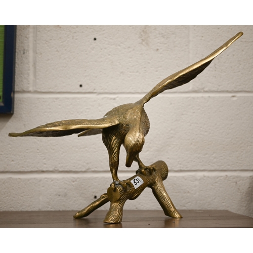 531 - A bronzed duck, taking off, 33 x 45 cm overall to/w a brass eagle and an Art Deco group of bronzed g... 