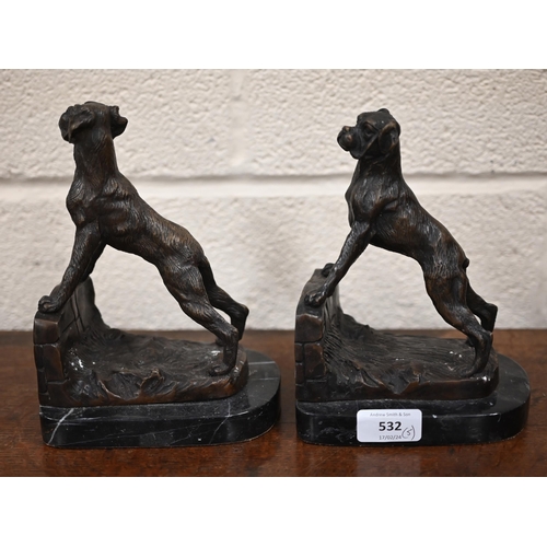 532 - Two painted and gilded bronze groups of gundogs, tied to a tree, signed 'Johnson' 32 cm high to/w a ... 