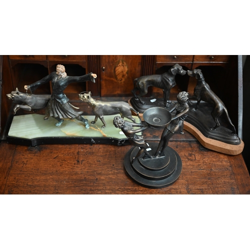 535 - A bronzed group of two hounds meeting, to/w an Art Deco style woman with dogs on marble base and an ... 