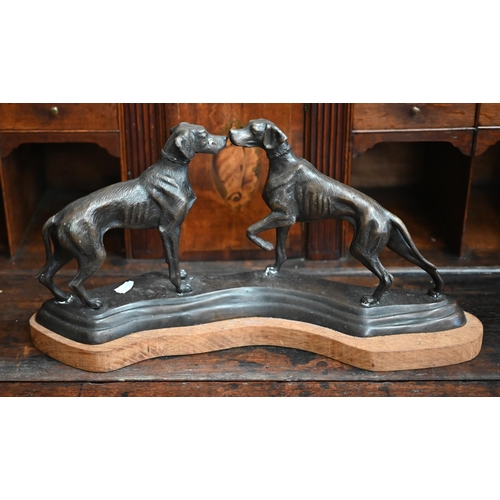 535 - A bronzed group of two hounds meeting, to/w an Art Deco style woman with dogs on marble base and an ... 