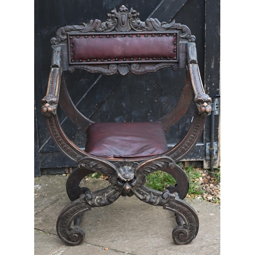 60 - A Victorian carved and moulded studded leather seat Bishops chair with dragon head arm terminals, on... 