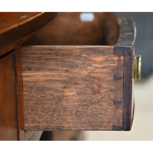 64 - An antique small mahogany bowfront sideboard, centred by a drawer flanked by a deep drawer and cupbo... 