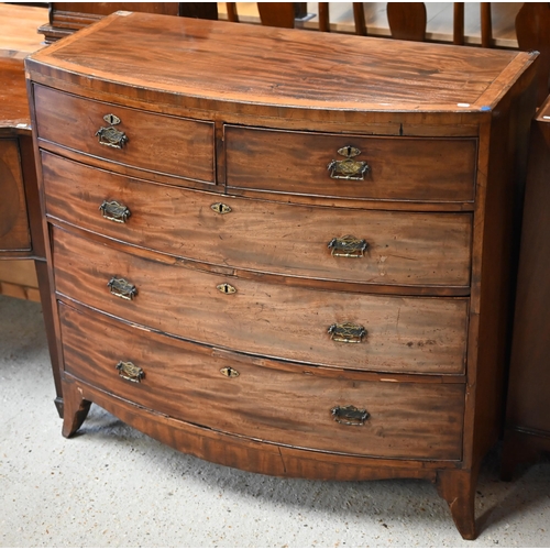 66 - A Victorian cross-banded mahogany chest of two short over three long graduated drawers, raised on sp... 