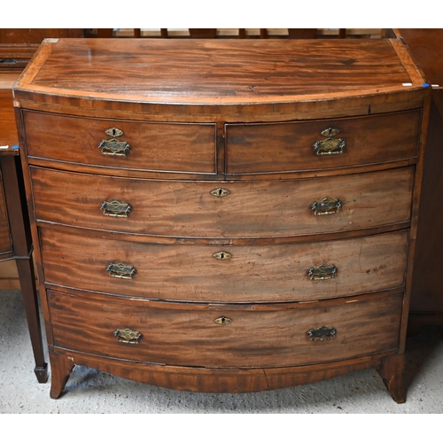 66 - A Victorian cross-banded mahogany chest of two short over three long graduated drawers, raised on sp... 