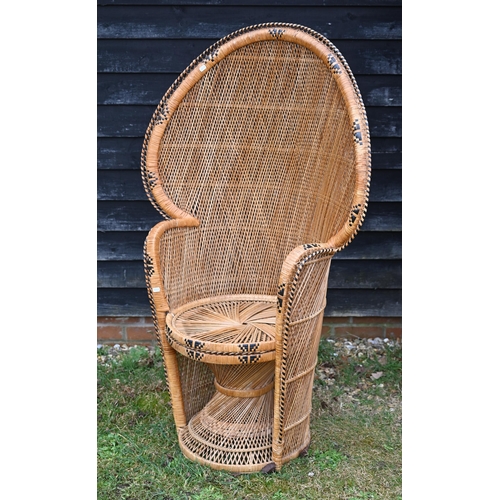 67 - A classic high fan back wicker chair circa 1970's