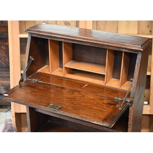 68 - A shallow oak bureau bookcase circa 1920s, 68 cm x 23 cm x 102 cm h