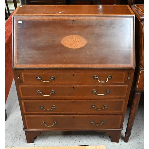 69 - #A Sheraton Revival cross-banded and inlaid satinwood bureau, with fitted interior over four long gr... 