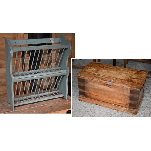 84 - A vintage wall hanging plate rack, later painted to/with a small old strap bound pine trunk, both a/... 