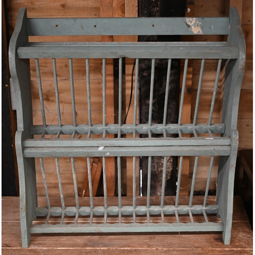 84 - A vintage wall hanging plate rack, later painted to/with a small old strap bound pine trunk, both a/... 