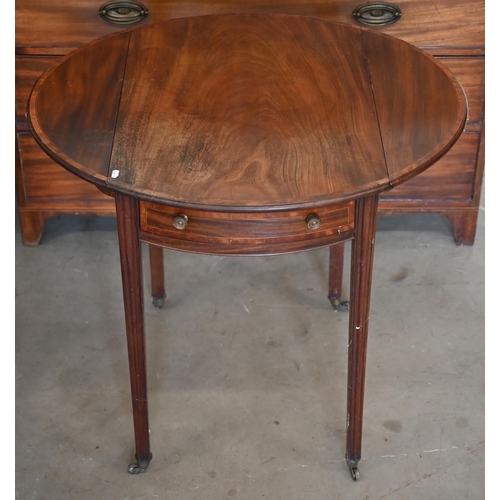 85 - A Georgian cross-banded mahogany drop leaf table, the oval top over a frieze drawer to one end, rais... 